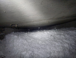 Zateplení stropu bytového domu pomocí foukané izolace